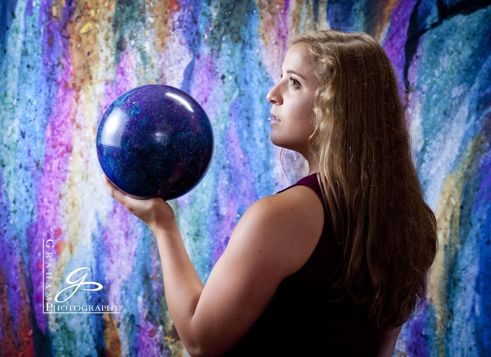 Sam holding a bowling ball